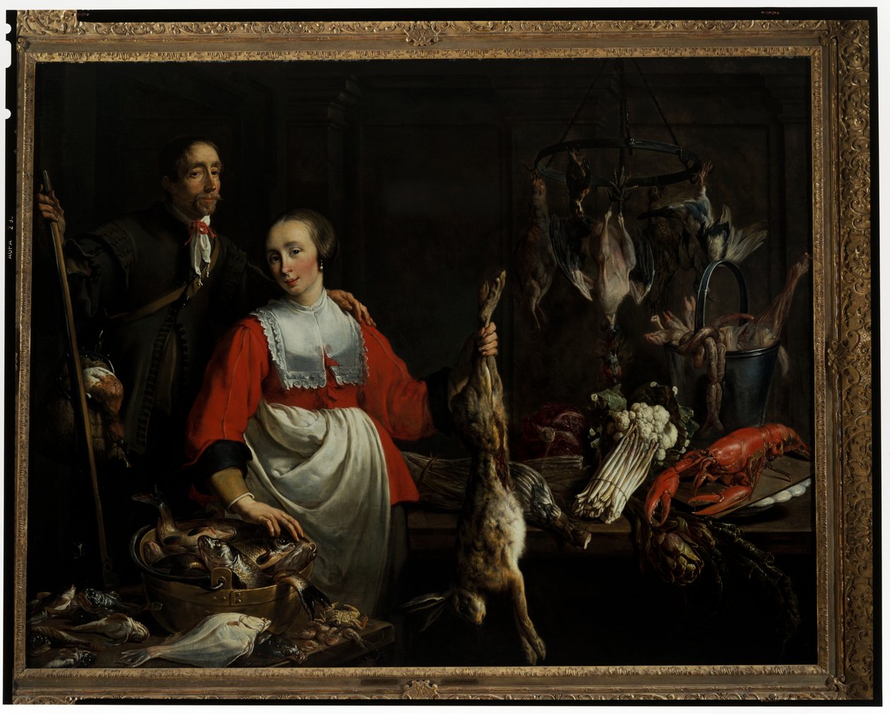 Elinde Punt Silahı olan bir Bekçi ve Kilerde ölü bir Tavşanı tutan bir Hizmetçi by Adriaen van Utrecht