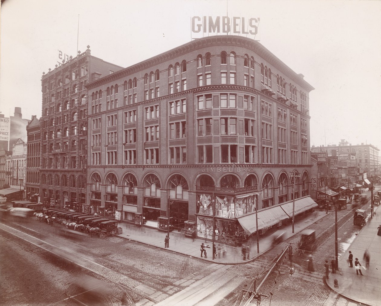Gimbel Brothers, Market Caddesi 9., Güneydoğu köşesi, 1899 (albüm baskısı) by American Photographer
