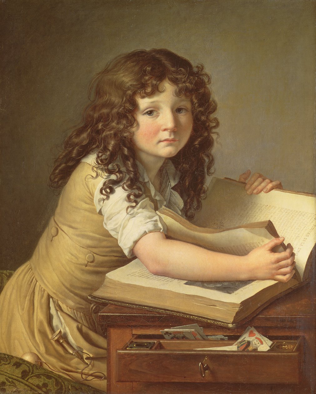 Bir kitaptaki resimlere bakan bir çocuk by Anne Louis Girodet de Roucy Trioson