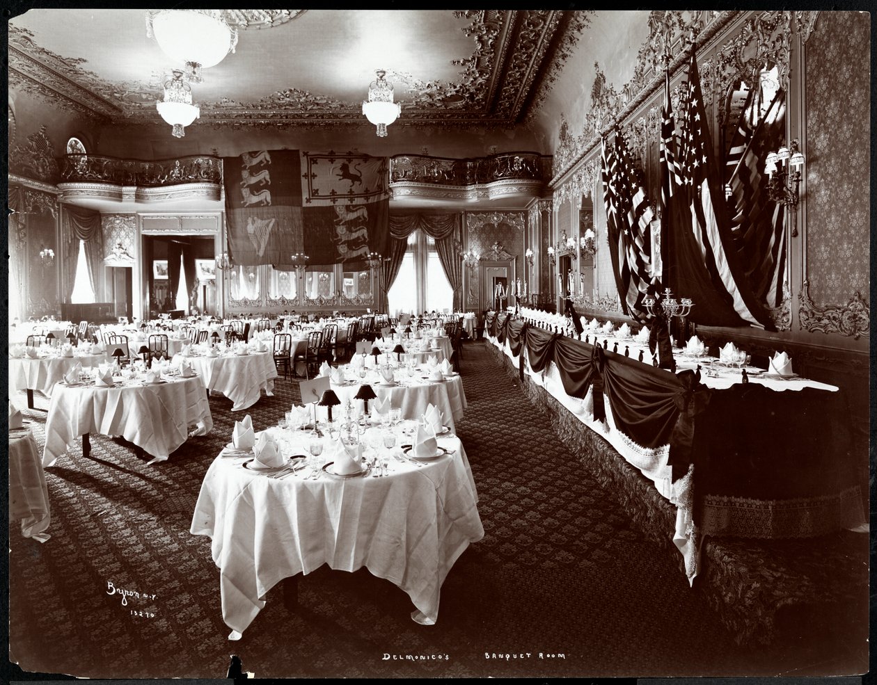 Tables set in the Banquet Room at Hotel Delmonico, 1902 (silver gelatin print) by Byron Company