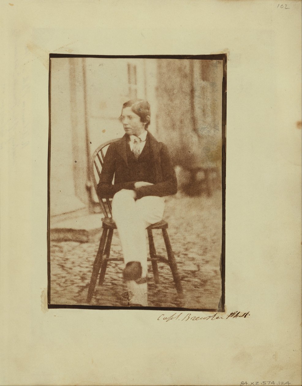 genç bir çocuk portresi by Capt. Henry Craigie Brewster