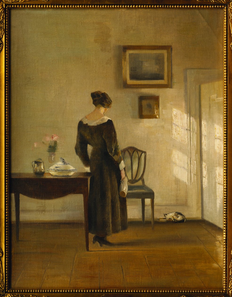 Kedi Besleyen Kadınlı Bir İç Mekan (tuval üzerine yağlı boya) by Carl Holsoe