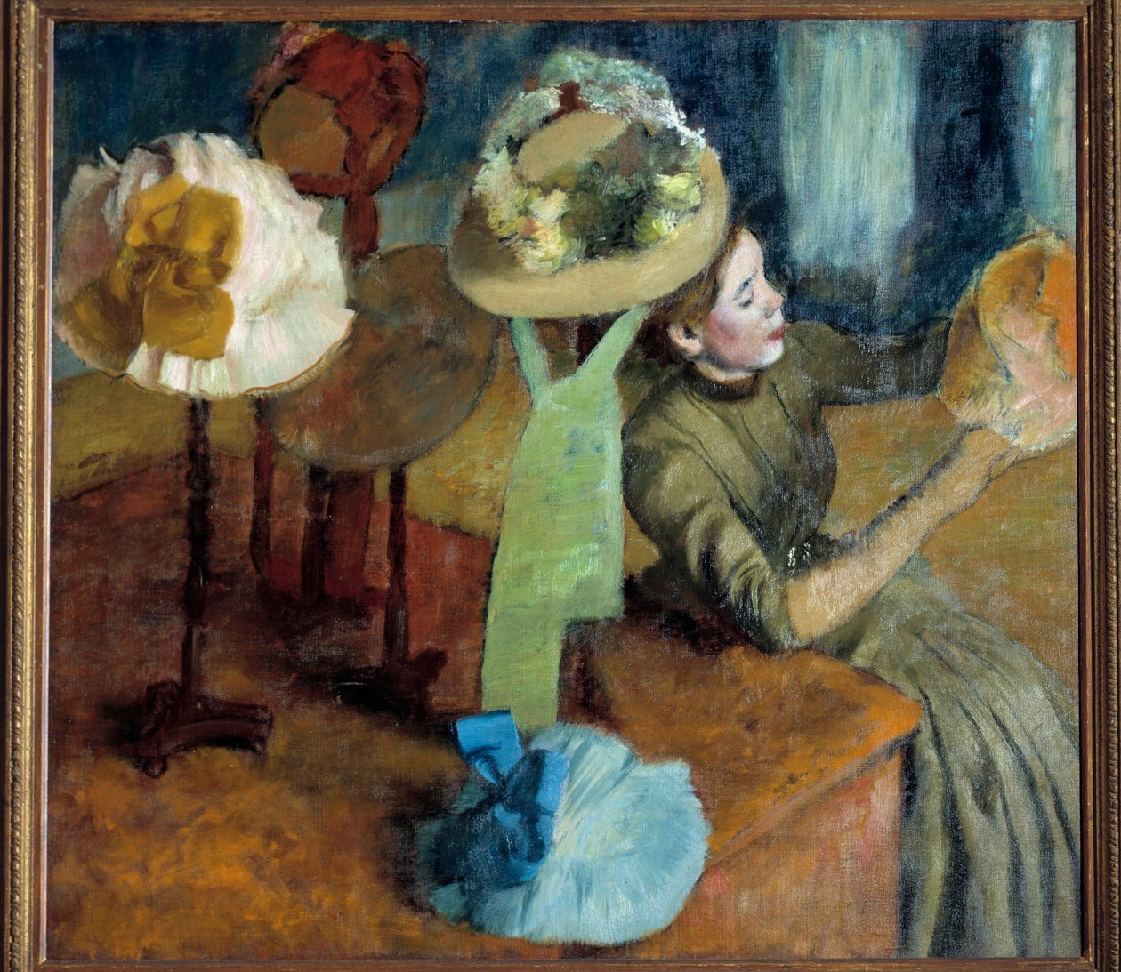 Şapkacıda (veya Tuhafiye Dükkanında) by Edgar Degas