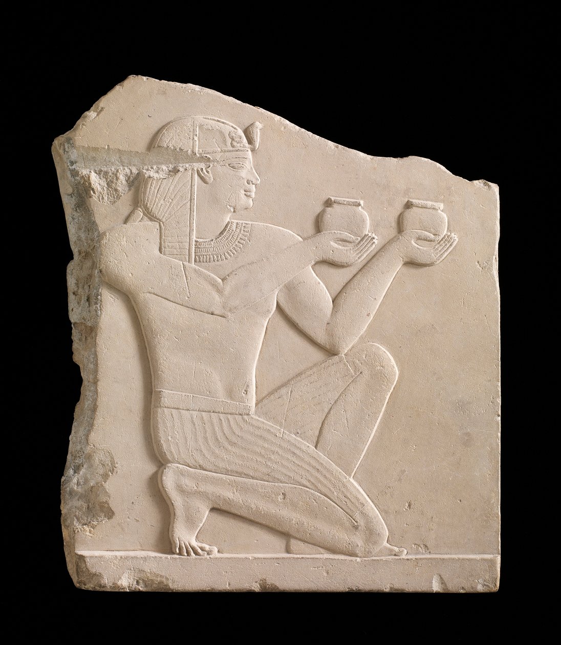 Şarap sunan bir kralı tasvir eden plaket, Ptolemaios dönemi, MÖ 305-30 yumuşak kireçtaşı by Egyptian Ptolemaic Period