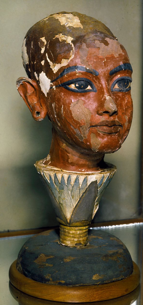 Egyptian antiquitis: portrait of the young pharaoh Tutankhamun (all-Ankh-amun or Tutankhamun) supported by a lotus leaf. Painted wood carving. From the Tresor of Tutankhamun. Egyptian Museum, Cairo. by Egyptian 18th Dynasty