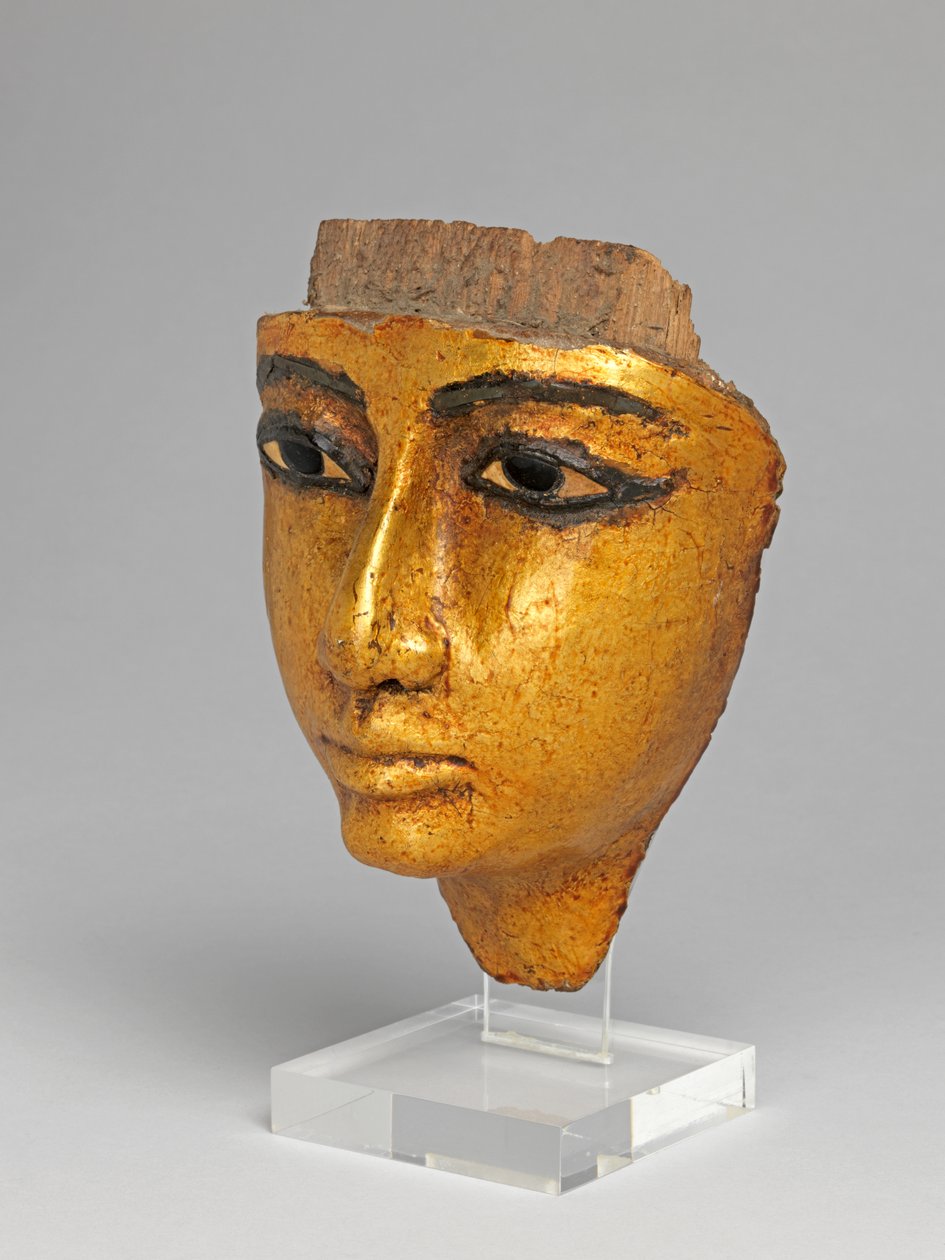 Gözleri ve kaşları işlemeli, yaldızlı bir tabuttan yüz by Egyptian 20th Dynasty