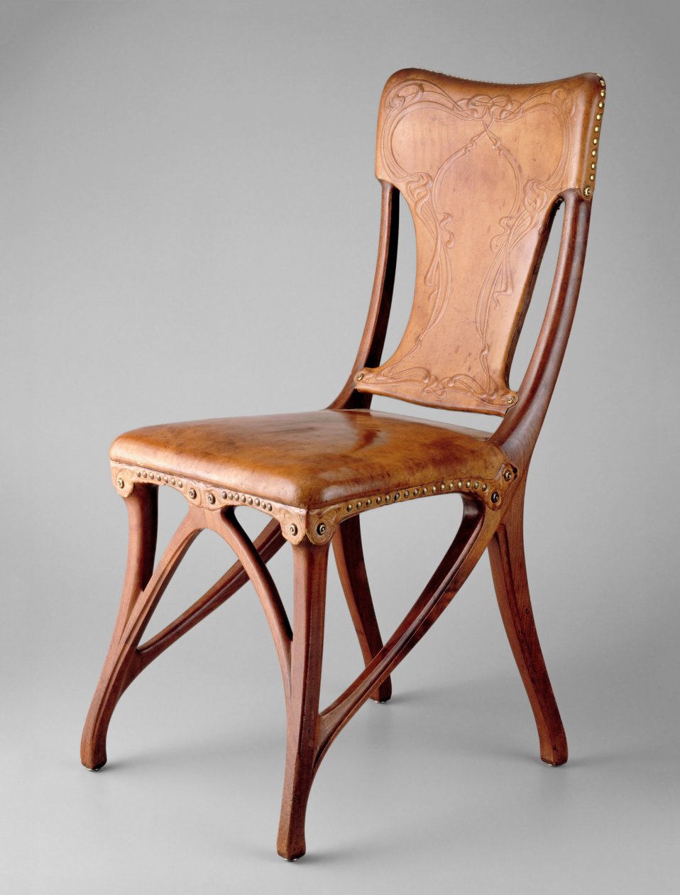Yan koltuk, 1900 (ceviz, deri ve pirinç çiviler) by Eugene Gaillard