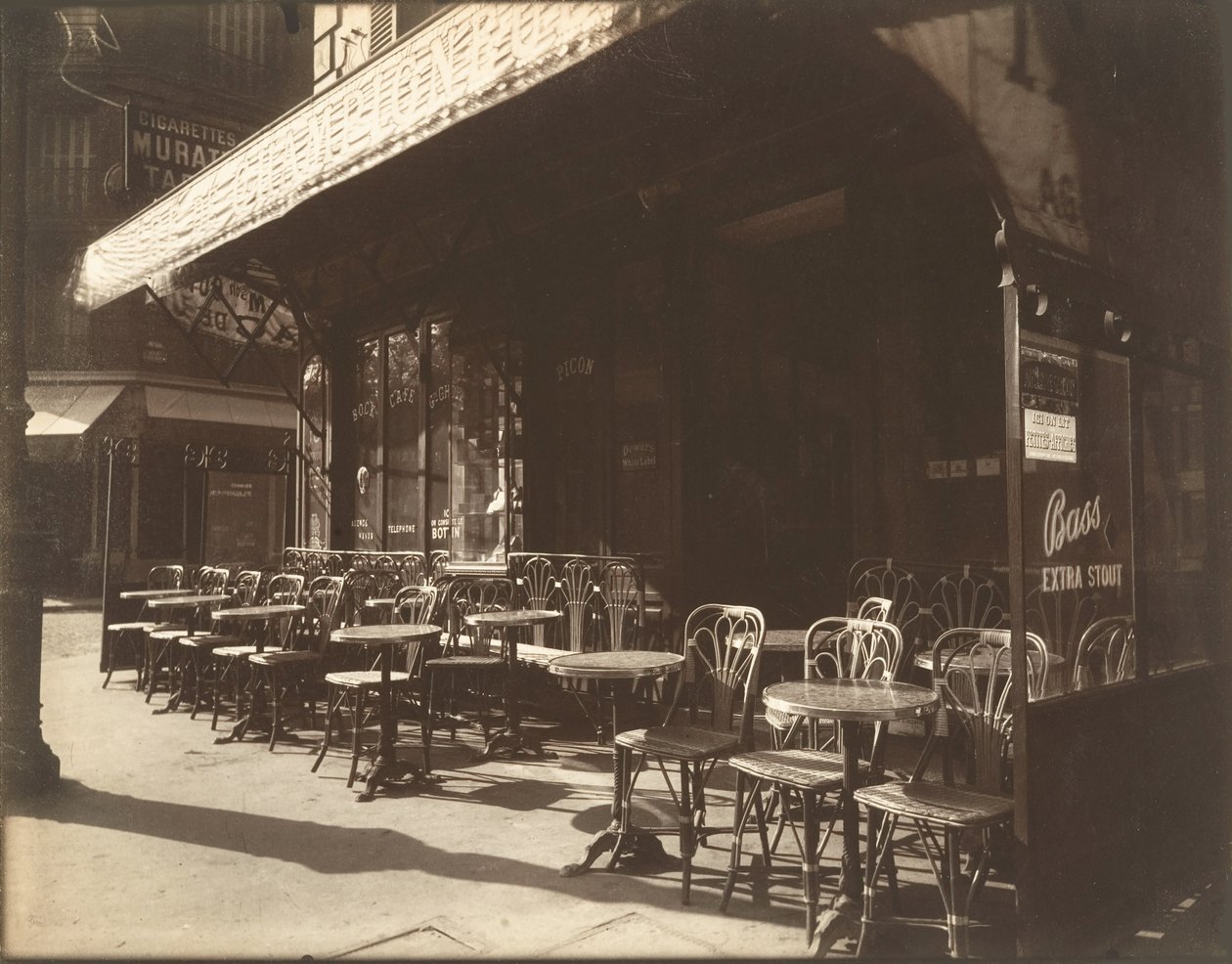Cafe, Avenue de la Grande-Armee, 1924-1925. by Eugène Atget