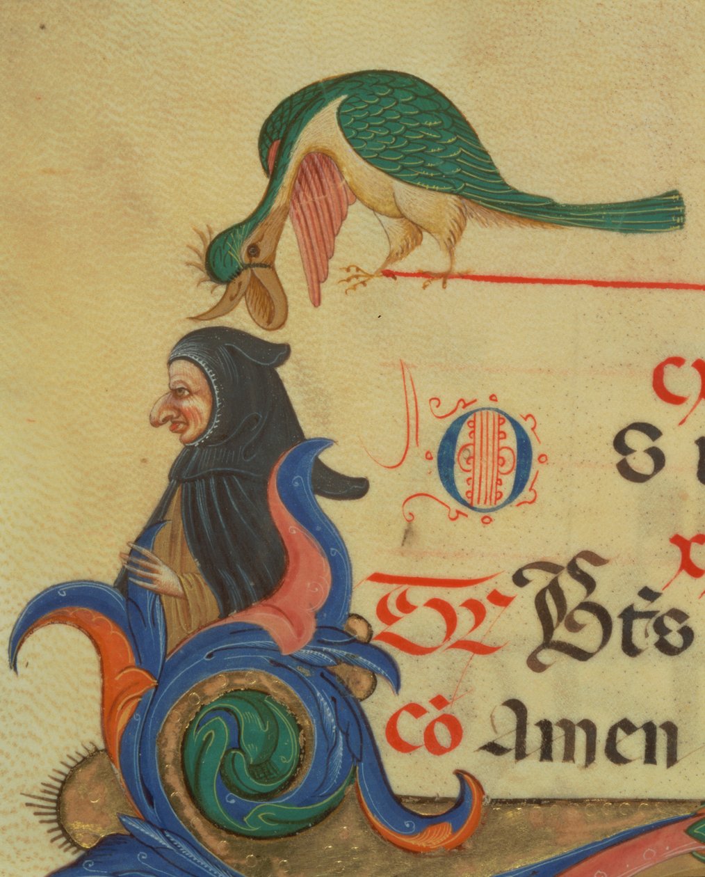 Missal 515 42r Pelerinli bir figürün üzerine tünemiş fantastik bir kuş, dekore edilmiş ilk R
