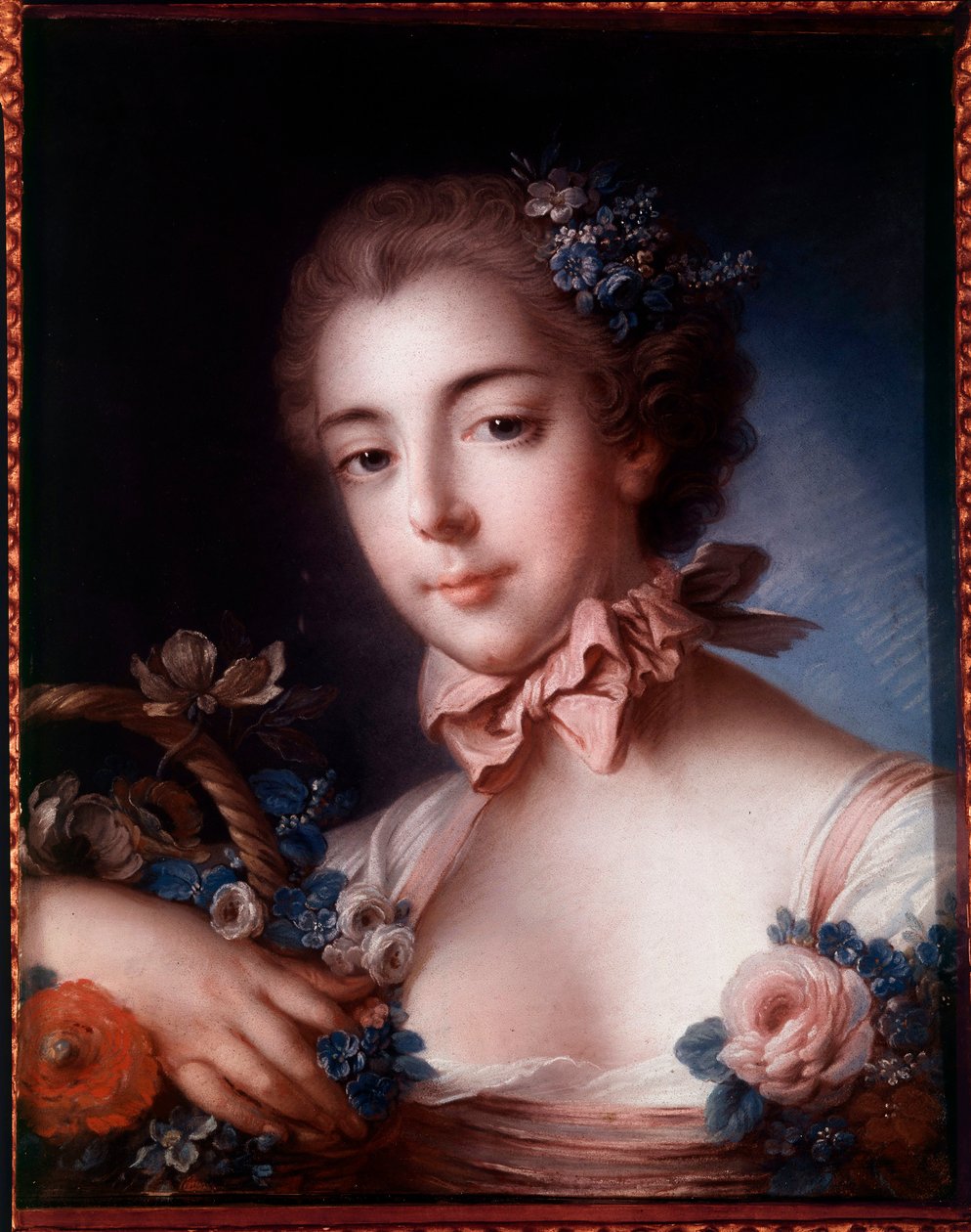 Çiçek sepetine yaslanmış genç bir kadının portresi. Francois Boucher