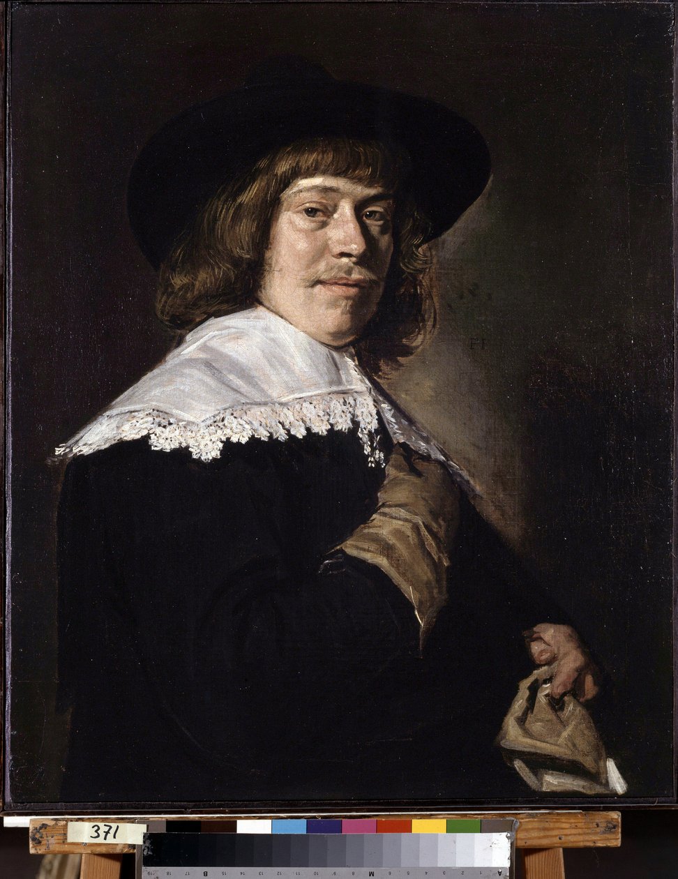 Eldiven tutan bir adamın portresi. Eldiven Tutan Genç Bir Adamın Portresi. Frans Hans Hals I (1581-1666), 1650 dolaylarında tablo. Tuval üzerine yağlı boya. Hollanda sanatı, barok tarzı. Ermitaj Müzesi, Saint Petersburg. by Frans Hals