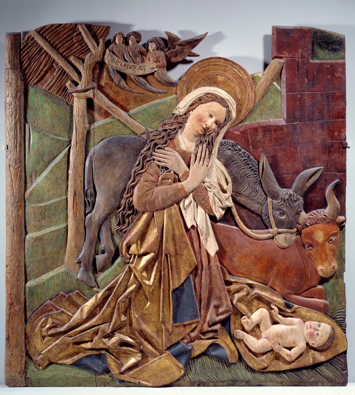 Alman ekolüne ait polikrom ahşaptan mihrabın iç tarafında Nativite Rölyef. 1510 Loş. 1,12x1,11 m Paris, Louvre Müzesi by German School