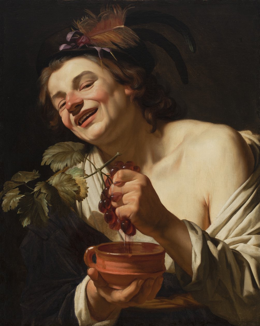 Üzüm Sıkan Gülümseyen Genç Adam, 1622 by Gerrit van Honthorst