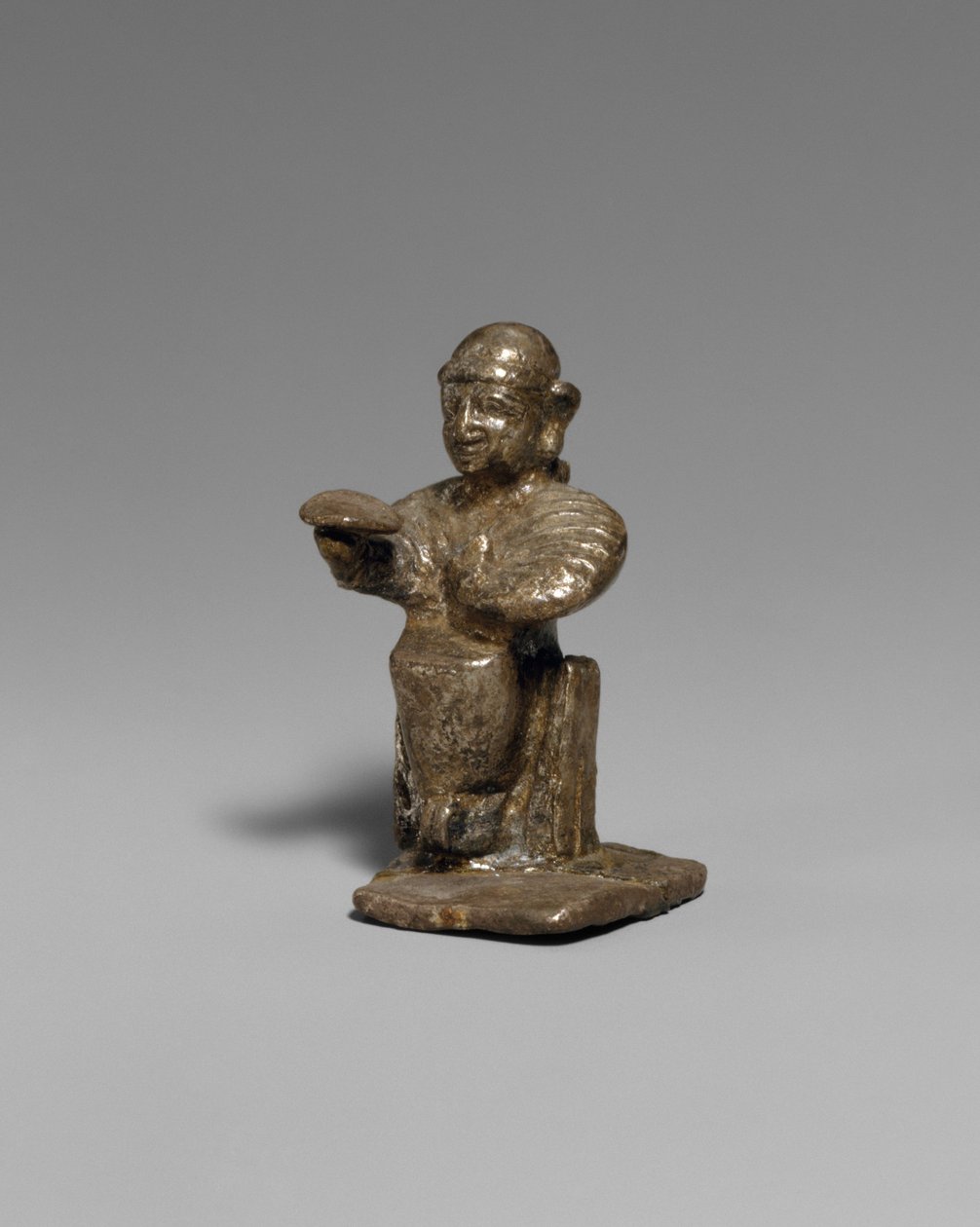 Oturan kadın, yaklaşık MÖ 14-13. yüzyıl (gümüş) by Hittite