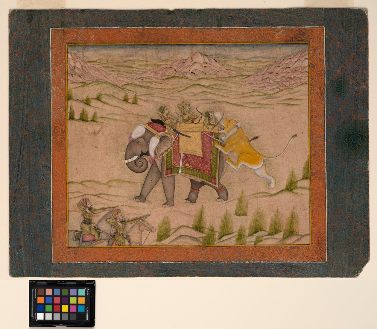 Bir aslan, bir filin tepesindeki bir av partisine saldırır, c.1810 (kağıt üzerinde opak suluboya ve altın rengi) by Indian School
