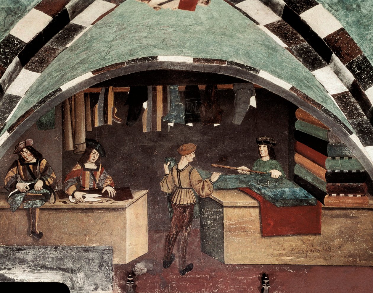 Terzi dükkanı. Bir adam dikiyor, bir diğeri kumaşı kesiyor ve üçüncüsü tekstili bir müşteriye satıyor. Fresk Kalesi Issogne (15. yüzyıl). by Italian School
