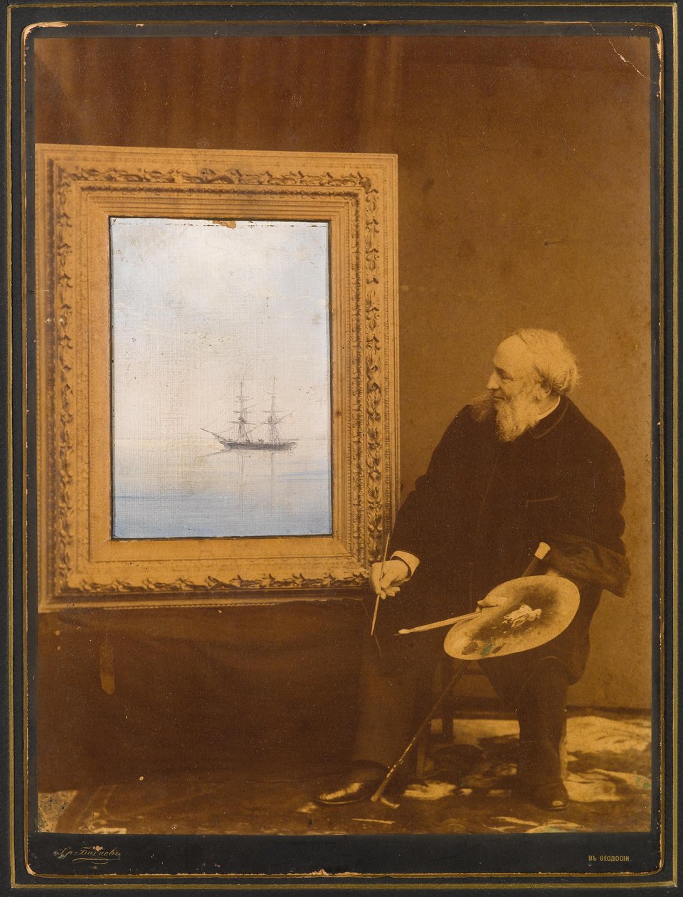 Sanatçının bir fotoğraf portresi ile bir deniz manzarası görünümü by Ivan Konstantinovich Aivazovsky