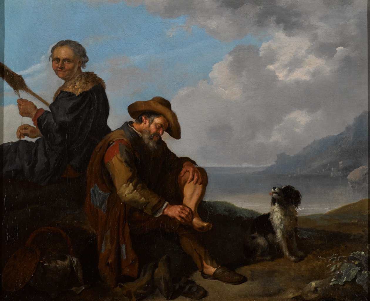 Bir çift figür ve bir köpek ile güney sahil manzarası by Jacob Toorenvliet