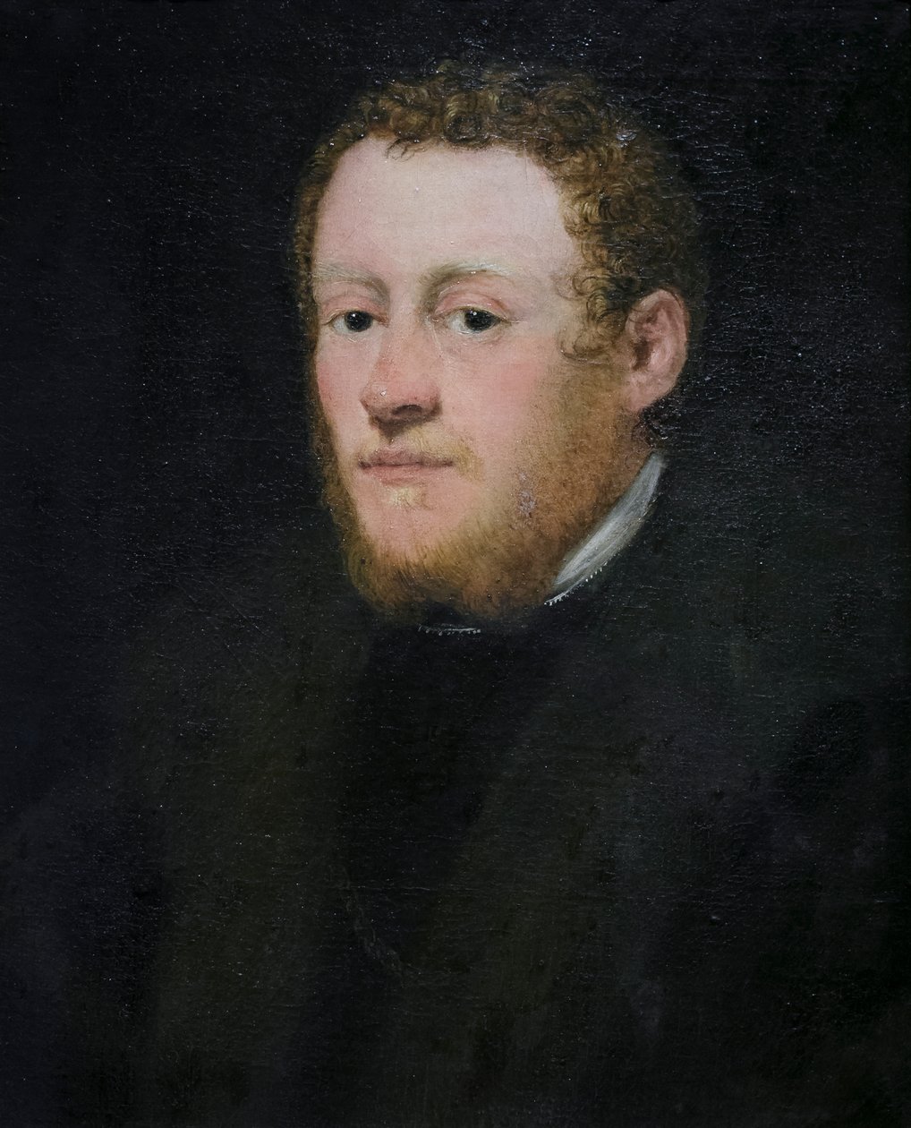 Kızıl saçlı genç bir adamın portresi by Jacopo Robusti Tintoretto