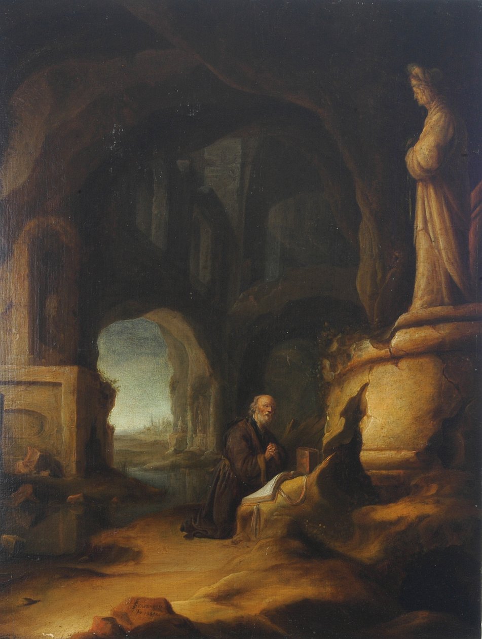 Klasik kalıntıları olan bir mağarada dua eden bir keşiş by Jan Adriansz van Staveren