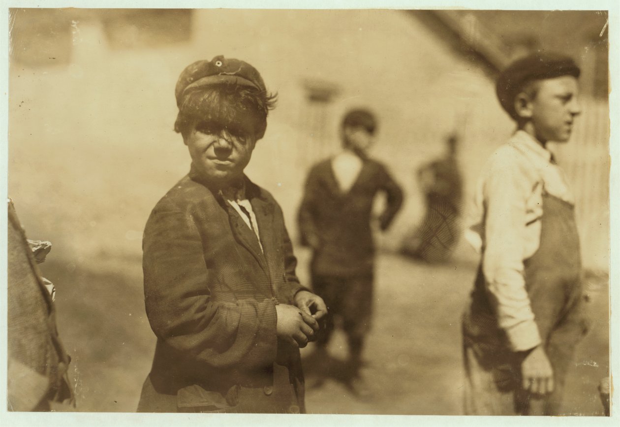 Joe (Jose) Mello, aged 8 or 9 works as a mill sweeper in New Bedford, Massachusetts, 1911 . by Lewis Wickes Hine