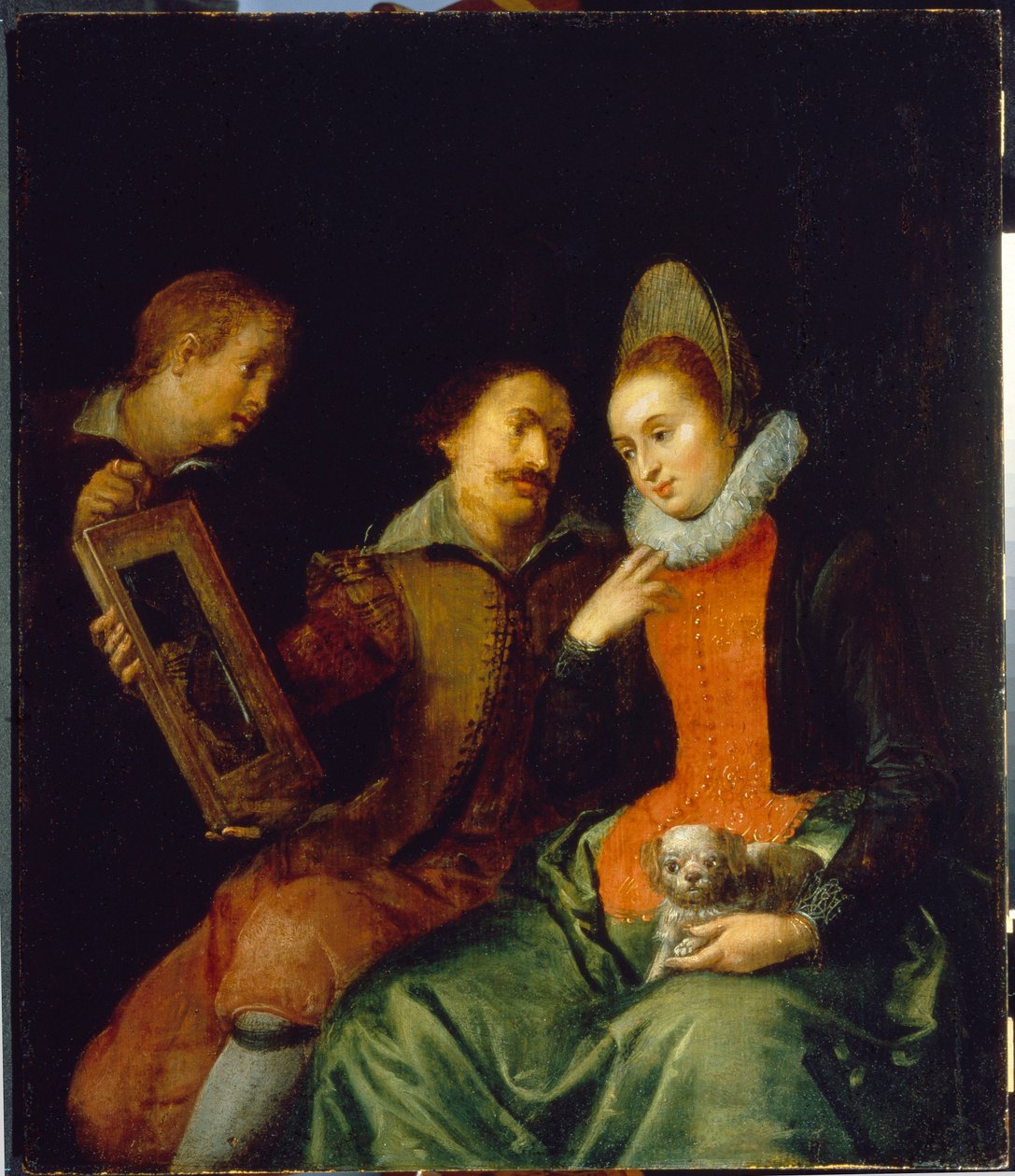 Görme alegorisi. Küçük bir köpeği taşıyan genç bir kadın, kendisine dikkatle bakan bir adam ve bir gencin tuttuğu aynada kendine bakıyor. Marten Pepyn (Pepin) (1575-1643), tuval üzerine yağlı boya, 17. yüzyılın başları, Flaman sanatı. kolleksiyon by Martin Pepyn or Pepin