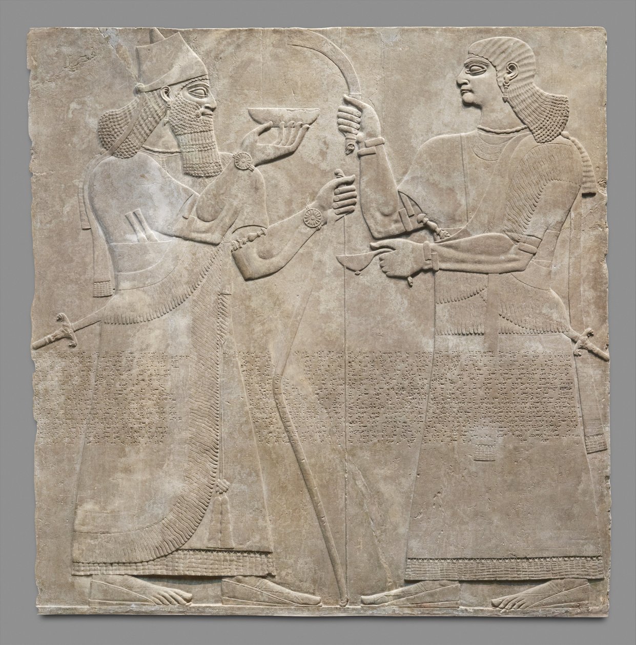 Kral ve hadım kabartması, MÖ 883-59 dolayları. (alçıtaşı kaymaktaşı) by Neo Assyrian