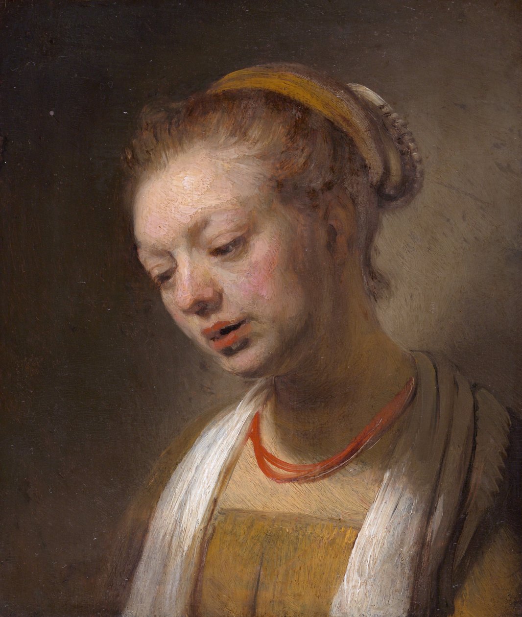 Kırmızı kolyeli genç kadın by Rembrandt van Rijn