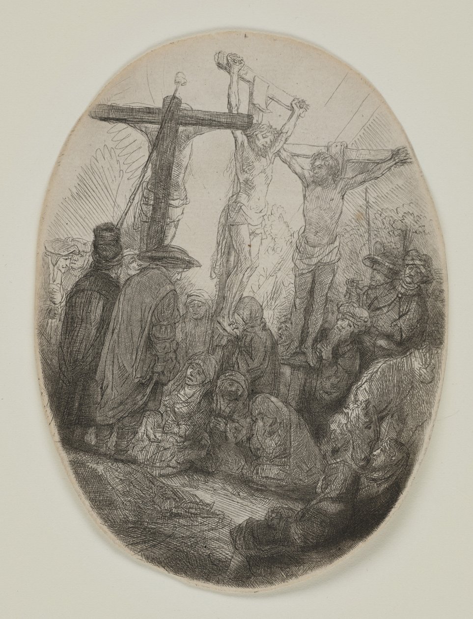 İki Hırsız Arasında Çarmıha Gerilmiş İsa: Bir Oval Plaka, c.1641 (aşındırma ve kuru nokta) by Rembrandt van Rijn