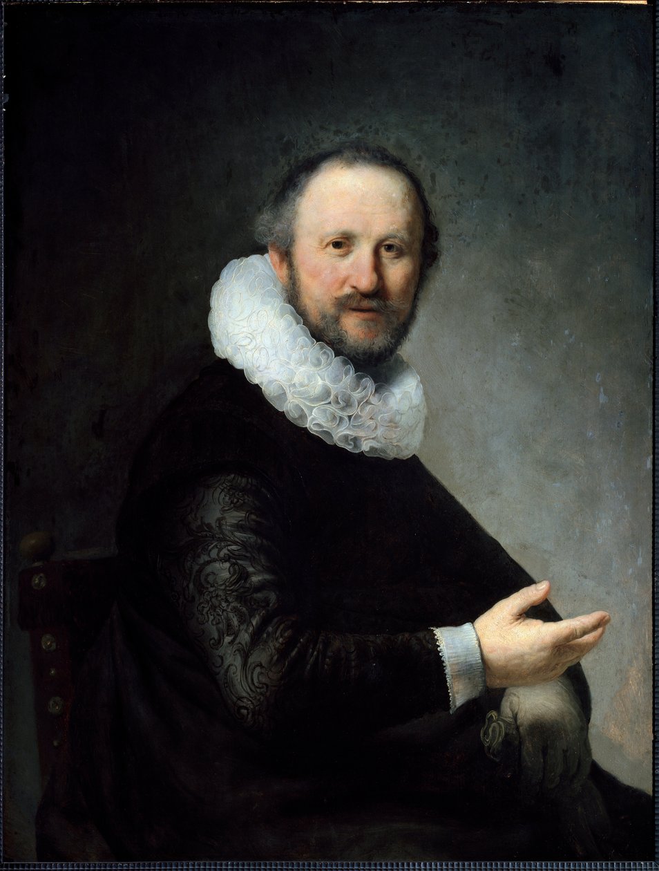 Hollandalı Burjuva eldivenlerini tutuyor, fırfır takıyor. (Tablo by Rembrandt van Rijn