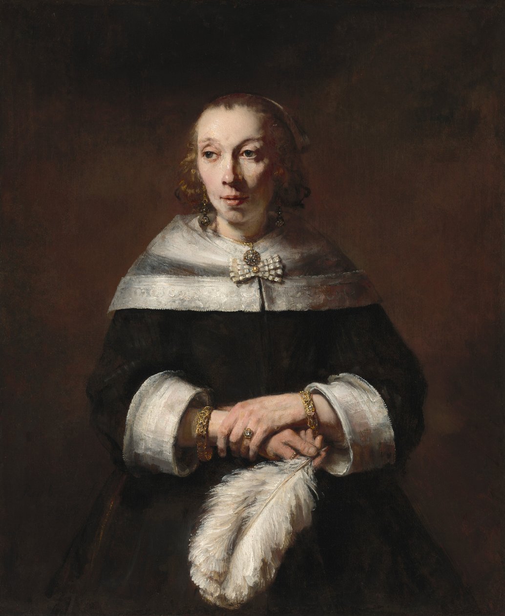 Devekuşu Tüylü Yelpazeli Bir Kadının Portresi, c. 16561658. by Rembrandt van Rijn