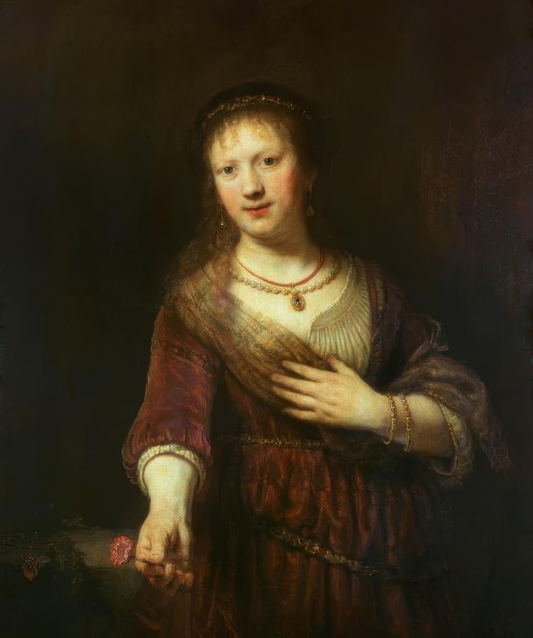 Kırmızı çiçekli Saskia by Rembrandt van Rijn