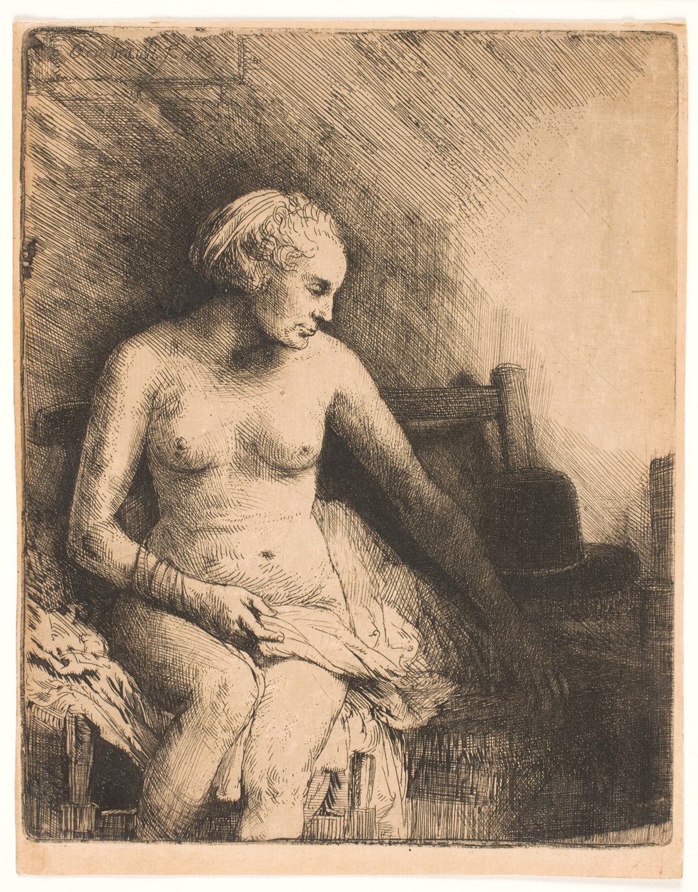 Kadının yanında bir şapka ile banyoda by Rembrandt van Rijn