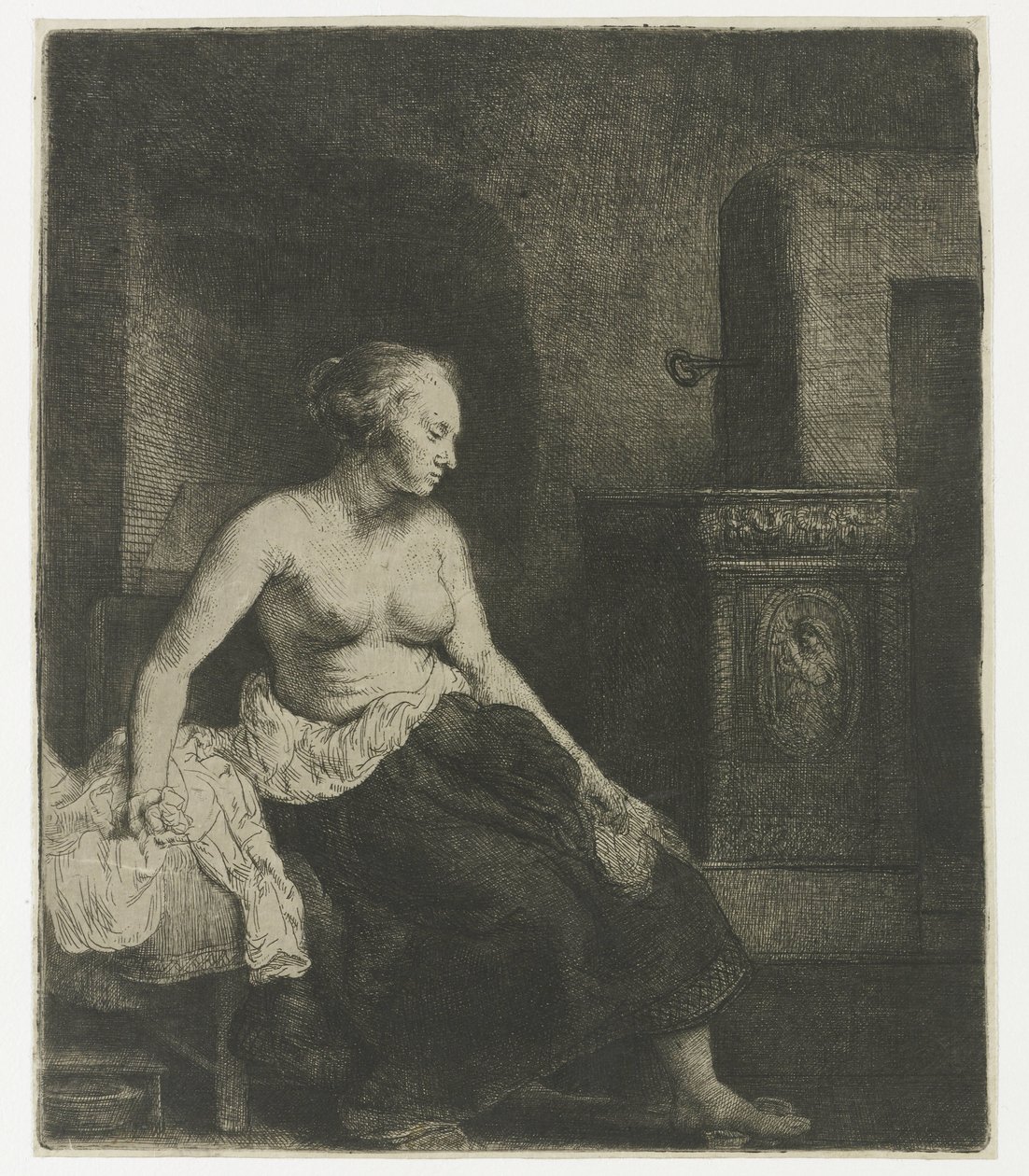 Bir sobanın yanında yarı giyinik oturan kadın by Rembrandt van Rijn