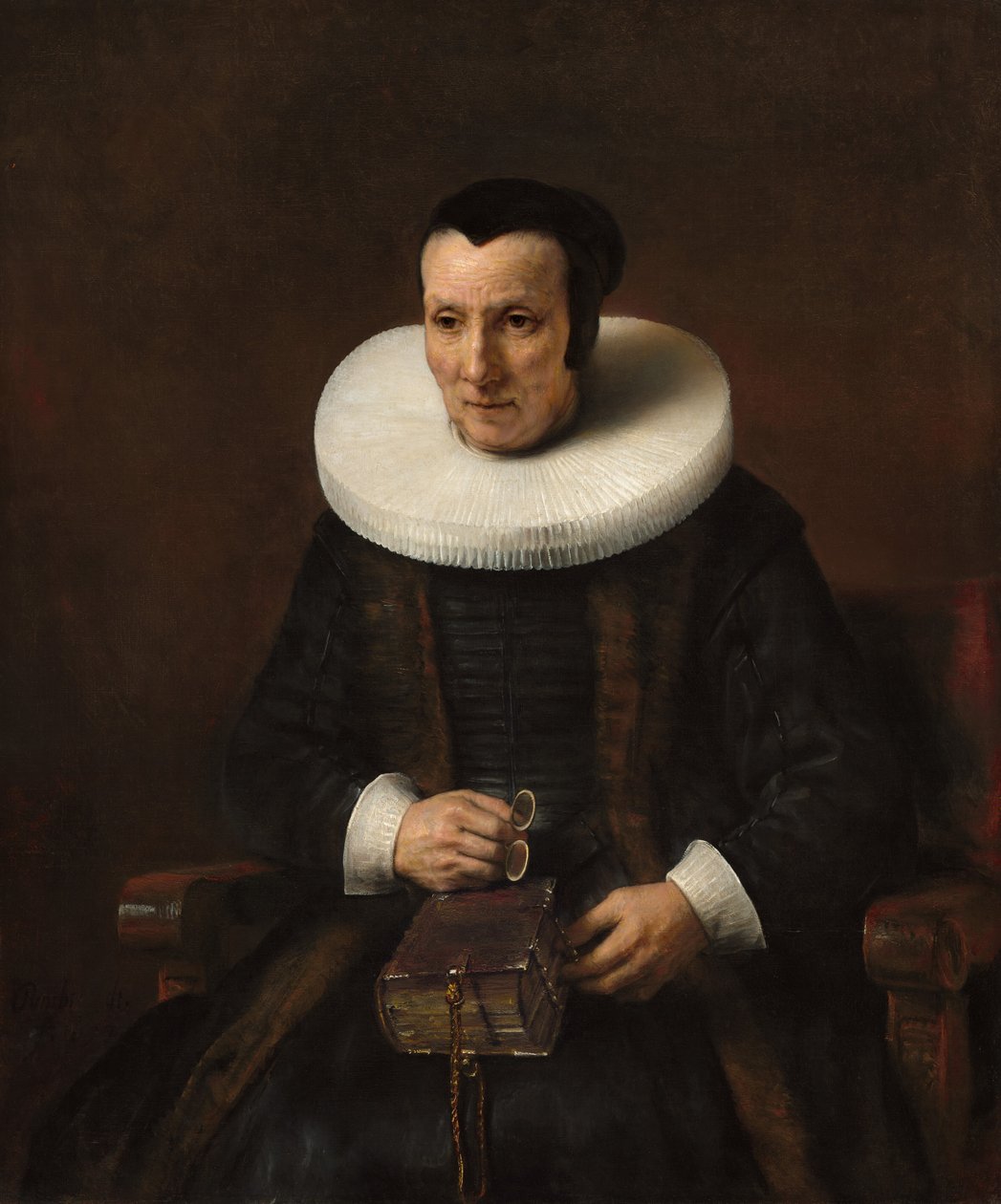 Elinde Kitap Olan Yaşlı Bir Kadın by Rembrandt van Rijn and Workshop
