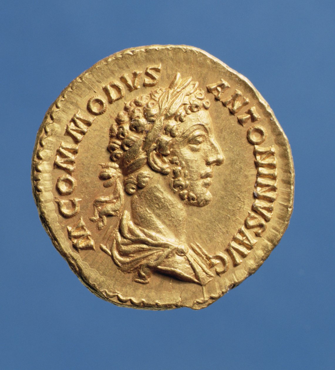 Commodus'un (180-192) Aureus (ön yüz) büstü bol dökümlü, sağda, defne çelengi takıyor. Yazıt: M ANTONINVS COMMODVS AVG (altın) by Roman