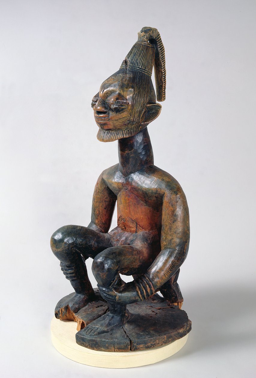 Oturan bir şefin Yoruba heykeli, Nijerya by School African
