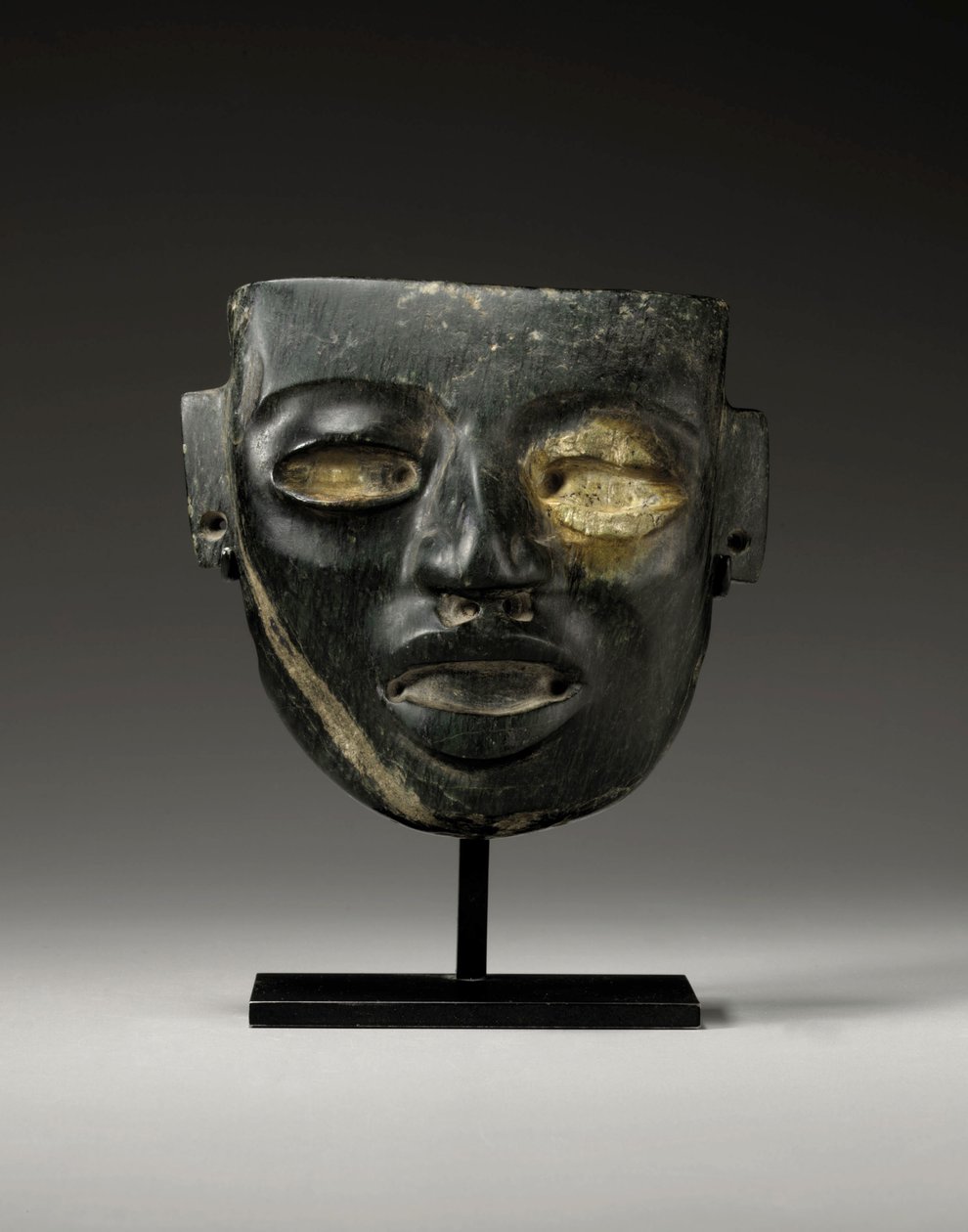 Bir devlet adamının genç yüzüyle oyulmuş bir Teotihuacan taş maskesi, c.450-650 by Unbekannt