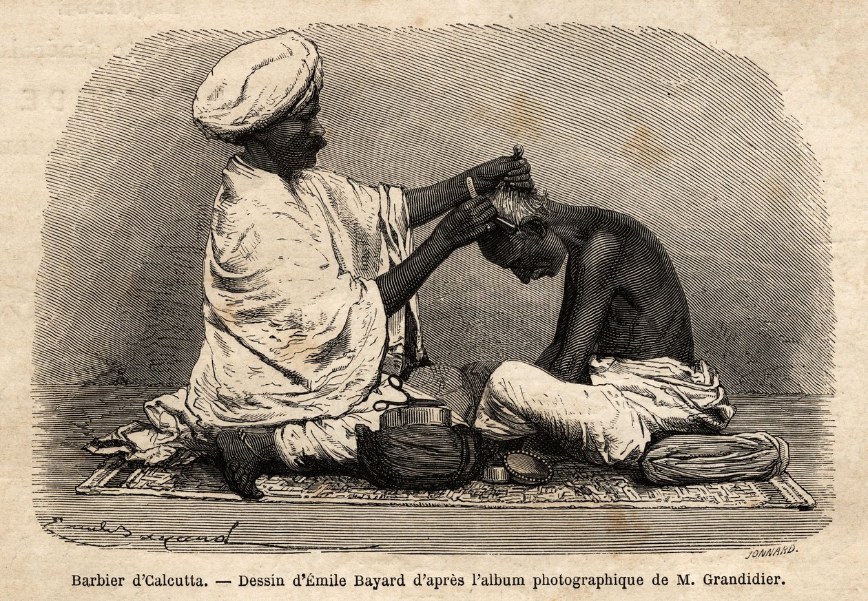 Kalküta sokaklarında çalışan bir berber. Hindistan