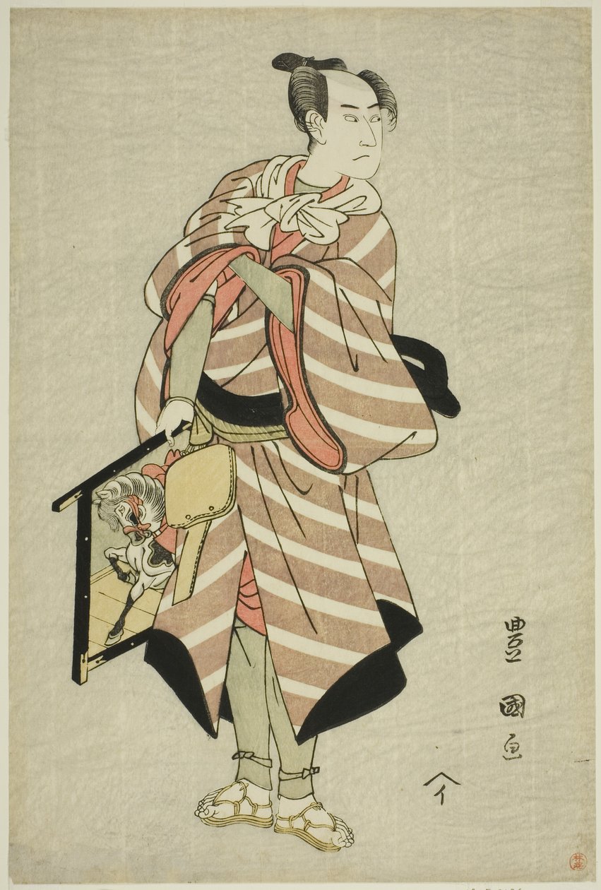 Aktör Sawamura Sojuro III, "Miyamairi Musubi no Kamigaki" oyununda yük binicisi Muchizo rolünde Kiri Tiyatrosu