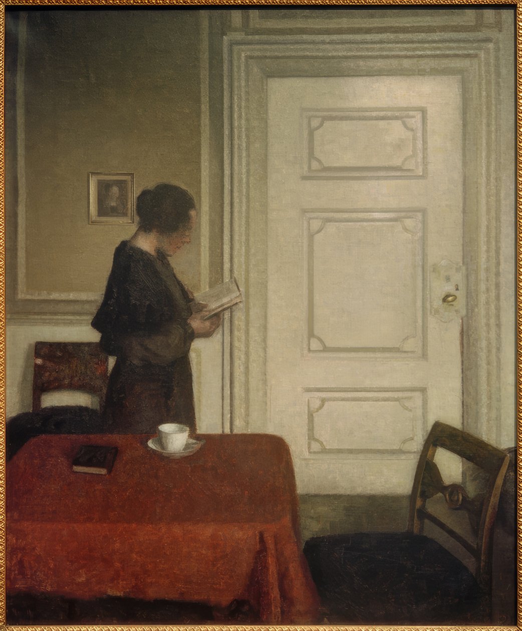 Lesende Frau by Vilhelm Hammershoi