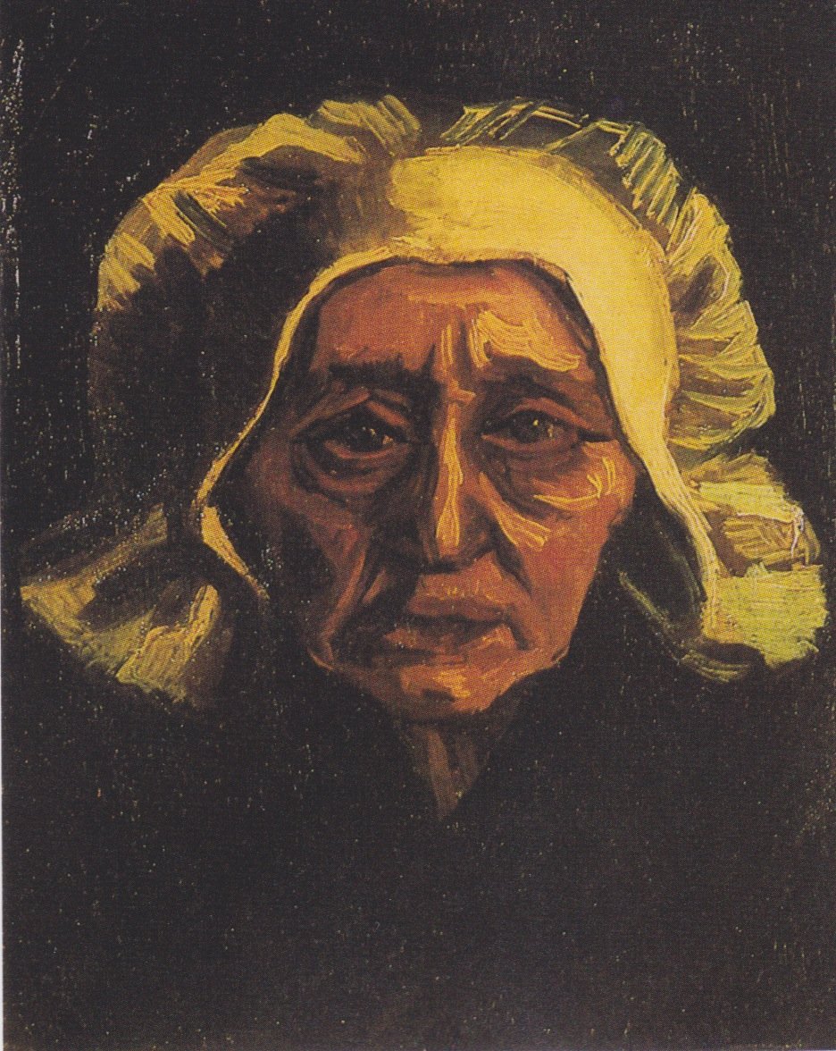 Beyaz başlıklı yaşlı bir köylü kadının başı by Vincent van Gogh