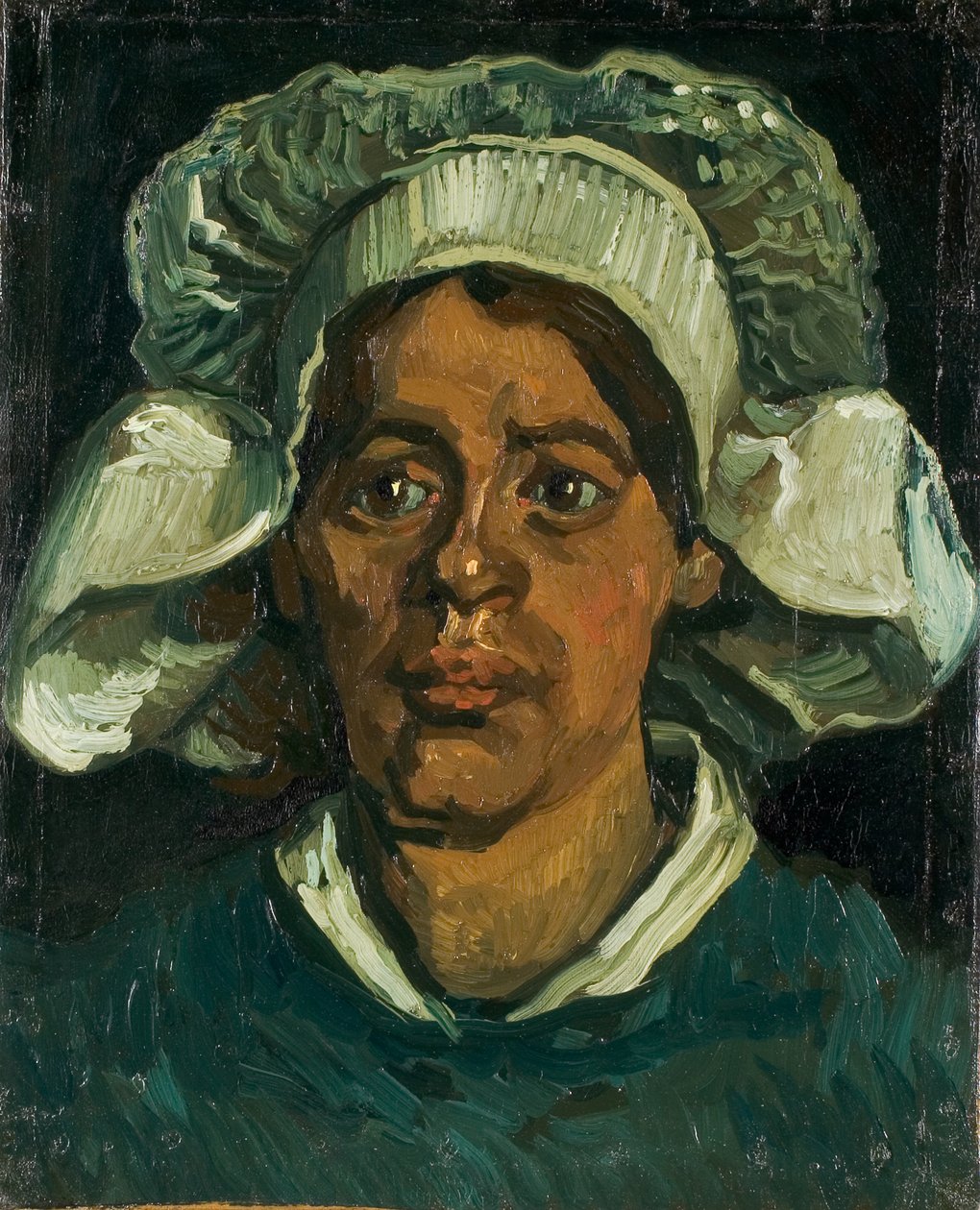 Beyaz başlıklı bir köylü kadının başı, 1884-1885. by Vincent van Gogh