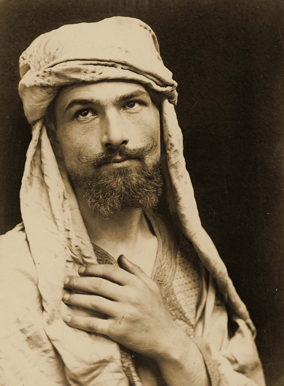 Baron Wilhelm von Gloeden'in (1856 – 1931) Arap kostümlü otoportresi, 1890 dolayları (sepya fotoğrafı). by Baron Wilhelm von Gloeden