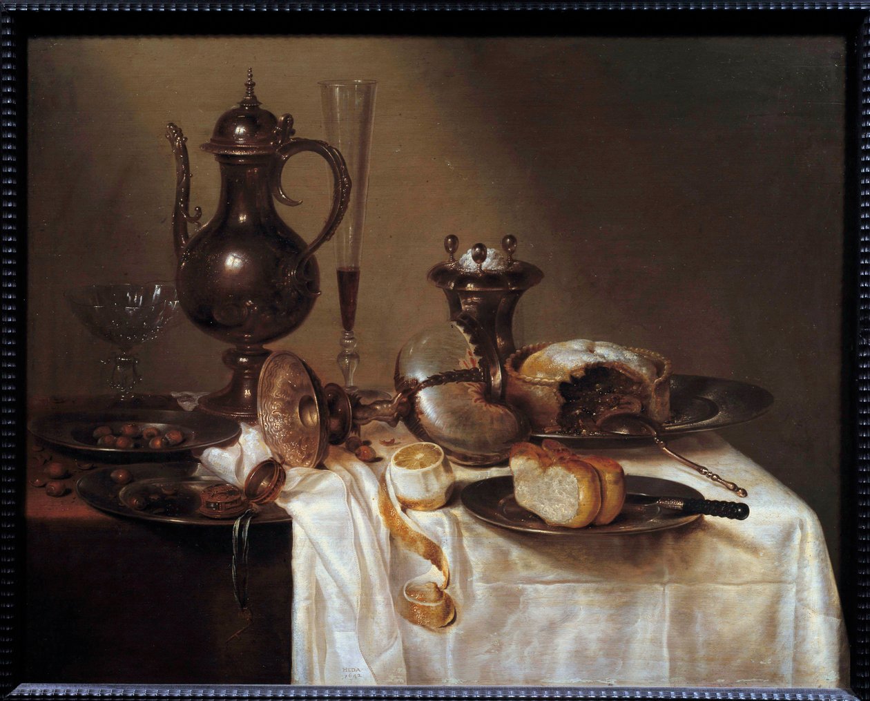 Nautile Masada gümüş eşyalar, ekmek, şarap flüt, turta ve soyulmuş limonla kaplı natürmort. Resim Willem Heda (1594-1670) 1642 Saint Etienne, Güzel Sanatlar Müzesi by Willem Claesz. Heda