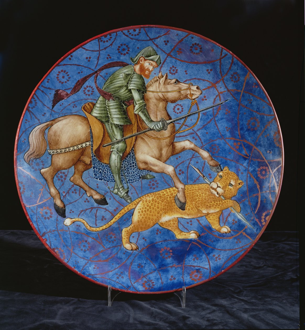 Bir leoparı mızraklamaya çalışan atlı bir şövalye ile şarj cihazı (seramik) by William de Morgan