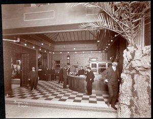 The lobby and registration desk at the Hotel Victoria, 1900 or 1901 (silver gelatin print)