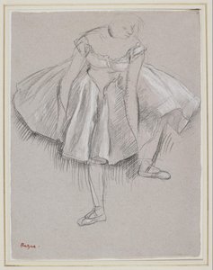 Dansçı terliğini ayarlıyor by Edgar Degas