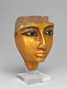 Gözleri ve kaşları işlemeli, yaldızlı bir tabuttan yüz by Egyptian 20th Dynasty