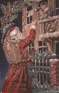 Noel Baba bir anne ve çocuğa el sallıyor by English School